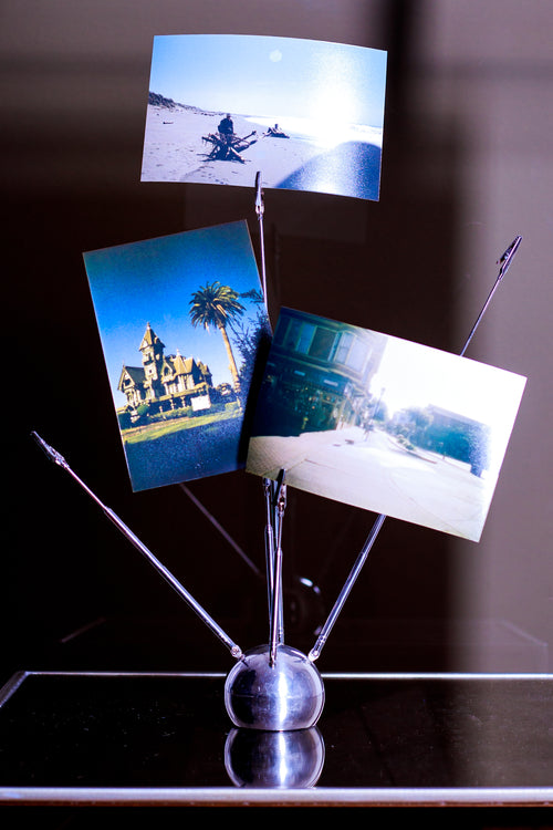 Chrome arm photo holder